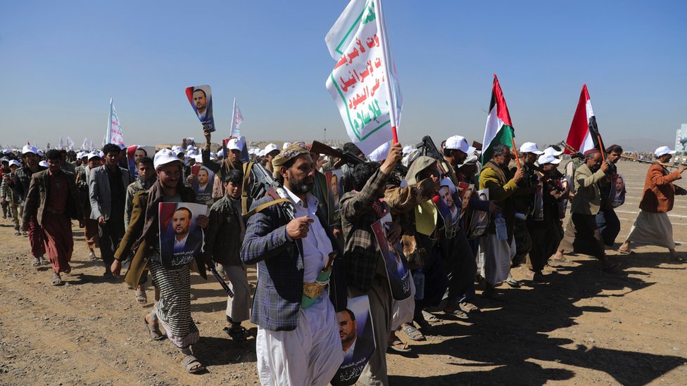 Armed Houthi followers parade during a protest to decry the US-led strikes on Houthi targets and to show support to Palestinians in the Gaza Strip, amid the ongoing conflict between Israel and the Palestinian Islamist group Hamas, near Sanaa, Yemen on 25 January 2024