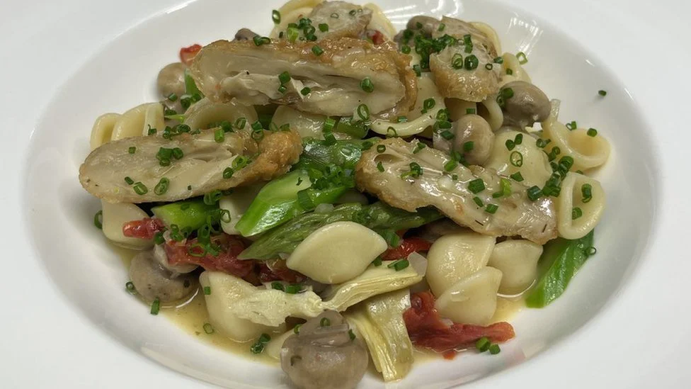 A pasta dish prepared using Eat Just cultivated chicken.