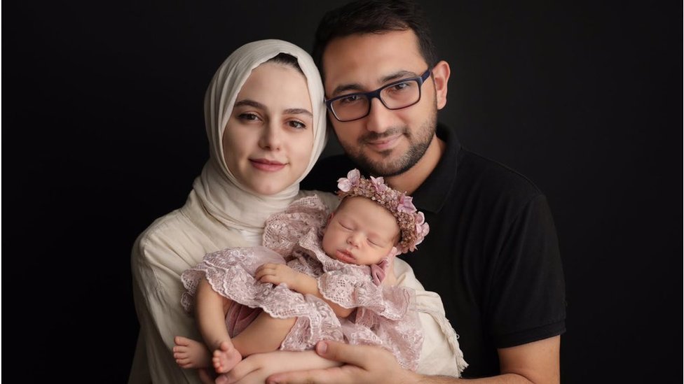Ahmet Can, his wife and baby daughter