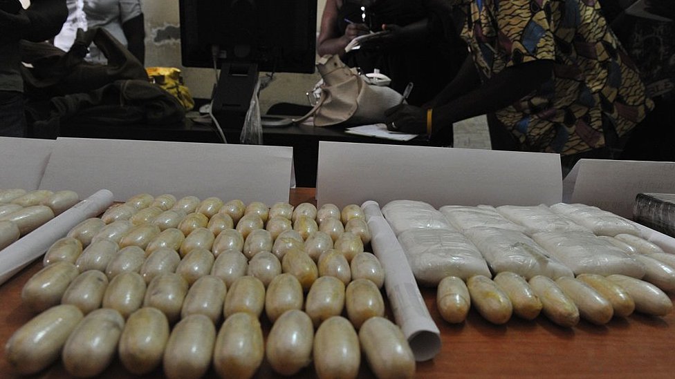Packets of seized cocaine are displayed at a police station in Bissau on 21 March, 2012