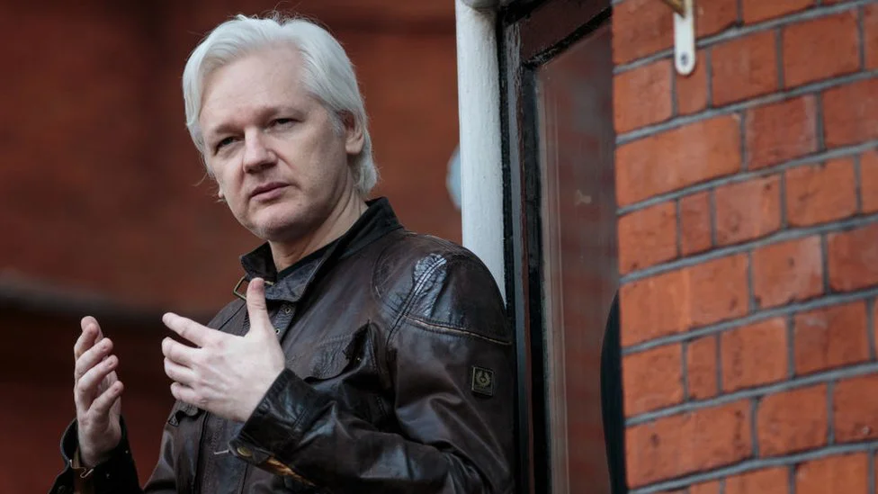 Julian Assange on a balcony at the Ecuador embassy