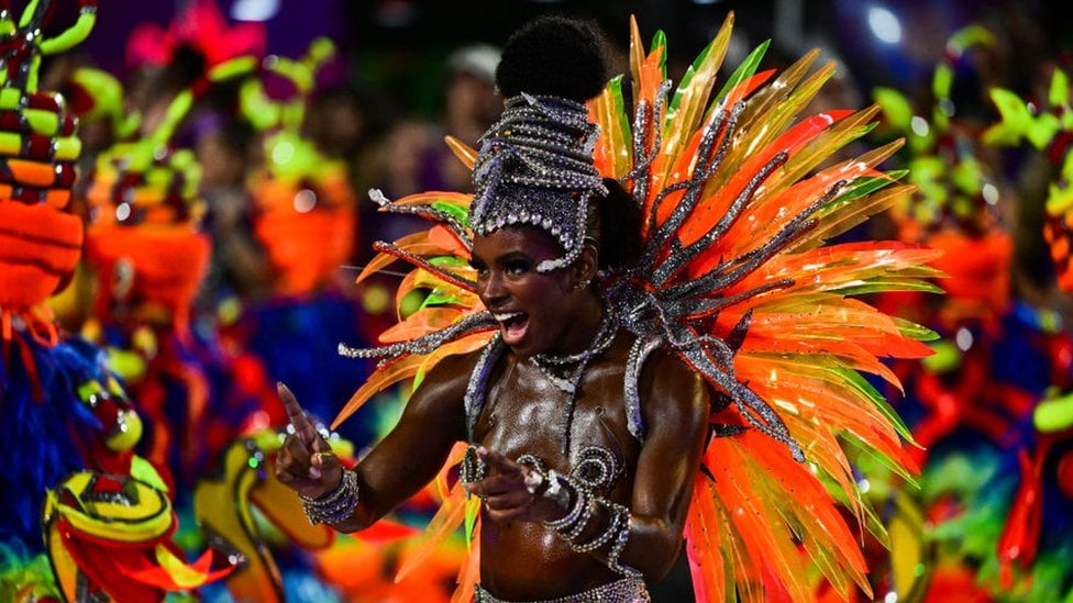 A member of the Unidos do Viradouro samba school performs during the last night of the Carnival parade at the Marques de Sapucai Sambadrome in Rio de Janeiro, Brazil, on February 13, 2024.