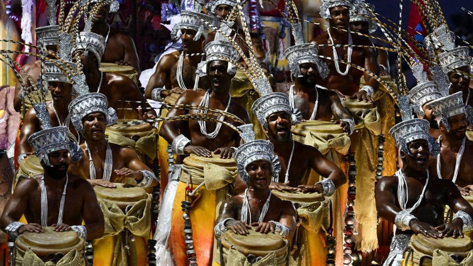 Members of the Unidos do Viradouro samba school perform during the last night of the Carnival parade at the Marques de Sapucai Sambadrome in Rio de Janeiro, Brazil, on February 13, 2024.