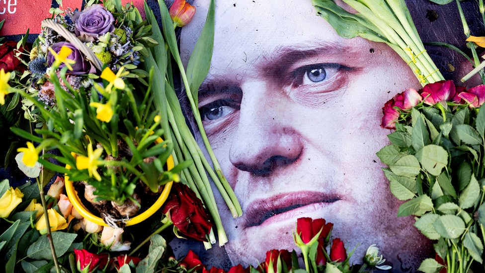 Flowers are laid outside the Russian embassy, following the death of Russian opposition leader Alexei Navalny, in Copenhagen, Denmark, February 17, 2024.