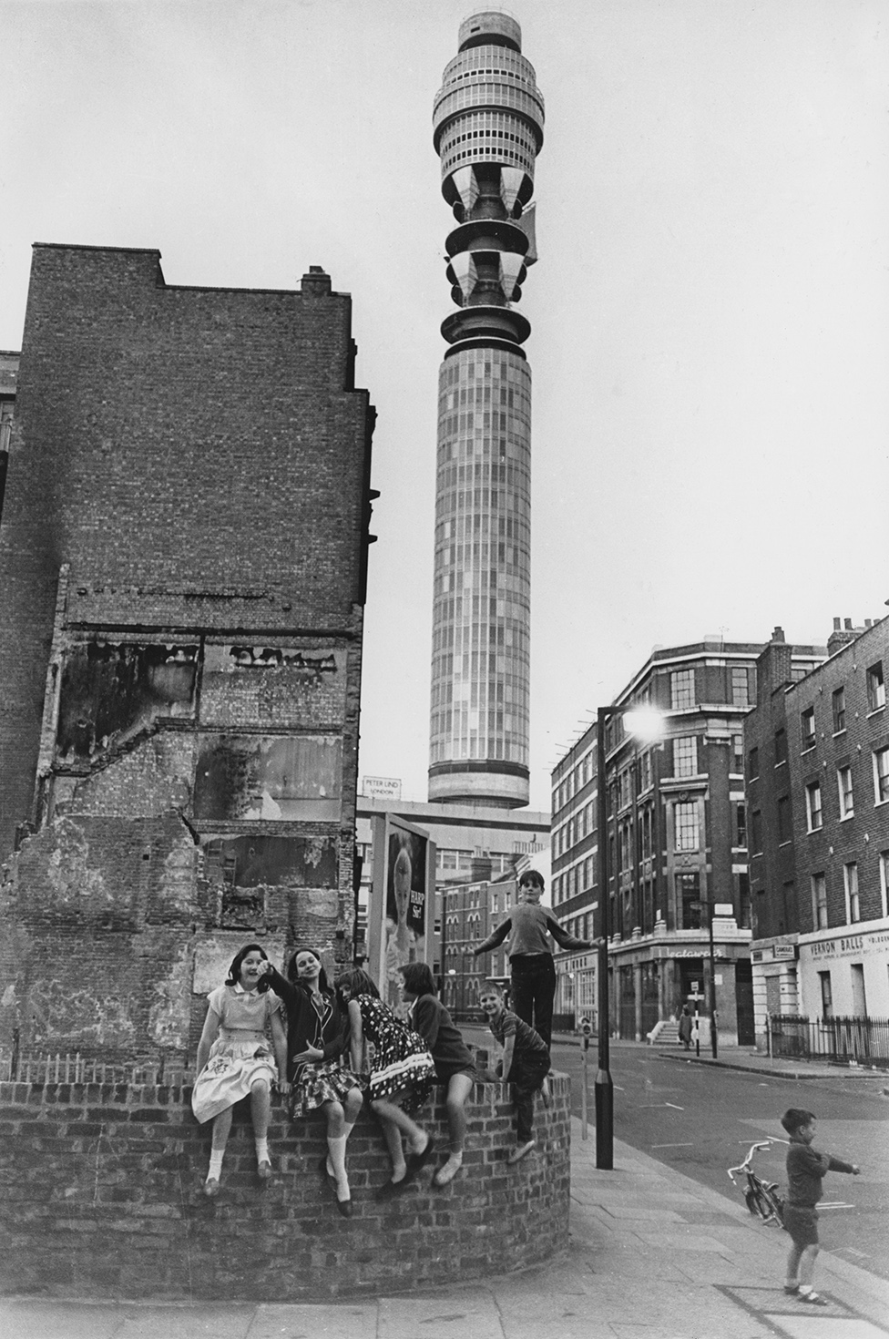 Children playing in front of the Post Office Tower, later the BT Tower, in London, 1965