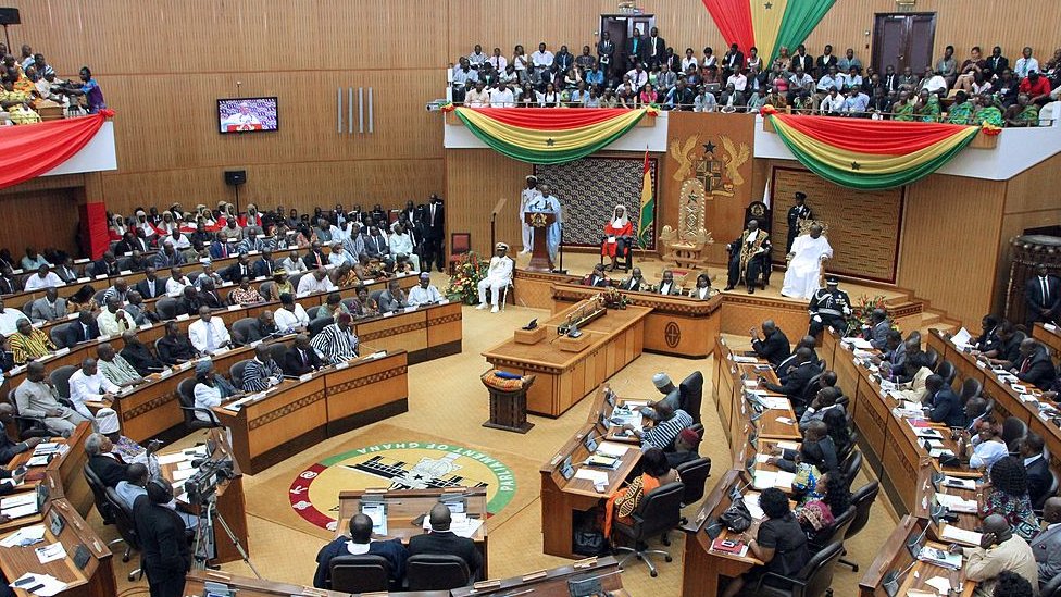 Ghana's President John Dramani Mahama (C, L) delivers his State of the Nation address at the Parliament on February 25, 2014 in Accra, Ghana.