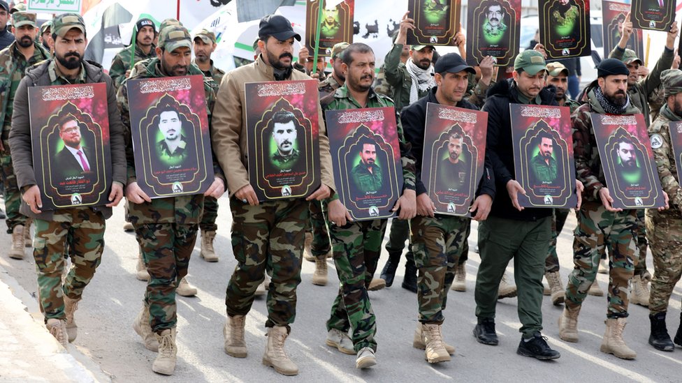 Members of the Iraqi Shiite Popular Mobilisation Forces (PMF) carry images of their comrades, who were killed in recent US air strikes in western Iraq, Baghdad, Iraq, 04 February 2024