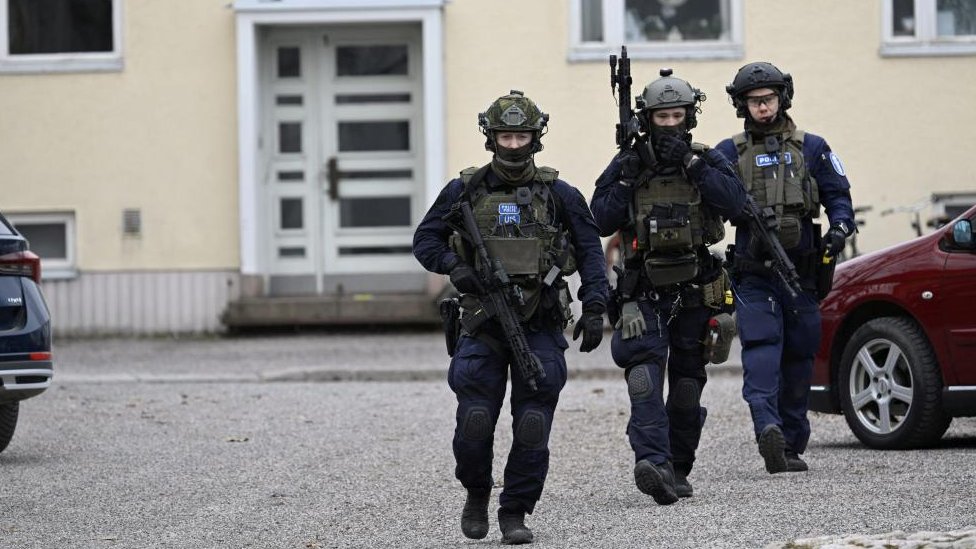 Police officers operate at the Viertola comprehensive school in Vantaa, Finland, on April 2, 2024