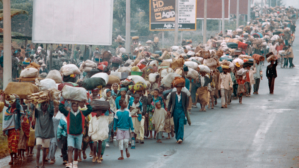Rwandan refugees cross the border at Goma to flee the Rwandan Patriotic Front (RPF) troops advance on the north-western town of Gisenyi - 19 July 1994