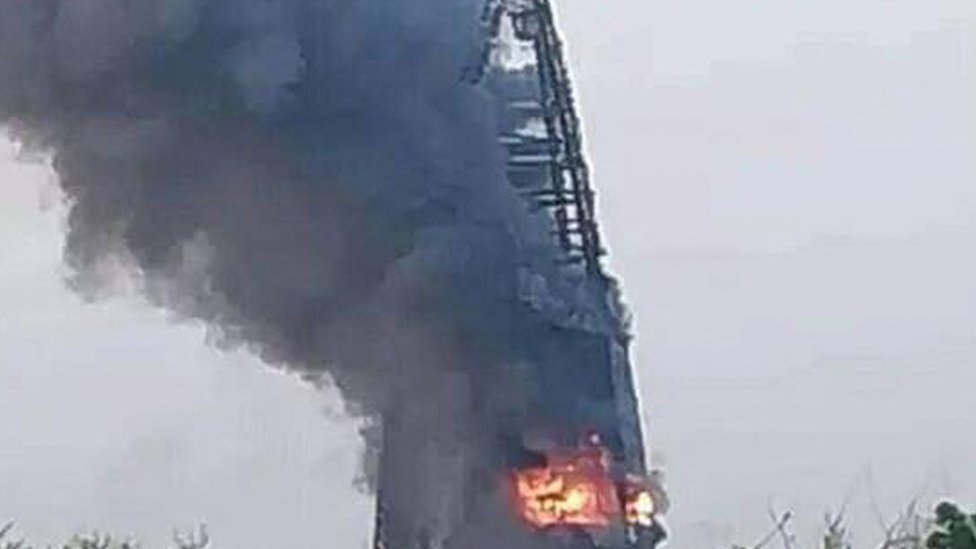 This picture taken on 17 September, 2023 shows a raging fire at the Greater Nile Petroleum Oil Company Tower in Khartoum.