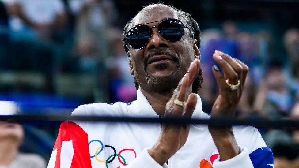 Olimpijske igre u Parizu 20214: Reper Snup Dog, najverniji navijač američkih sportista 1 Snup Dog na Olimpijskim igrama u Parizu 2024