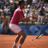 Trenutak u kojem je dosanjan san: Zlatni forhend Novaka Đokovića za zlatnu olimpijsku medalju (VIDEO) 1