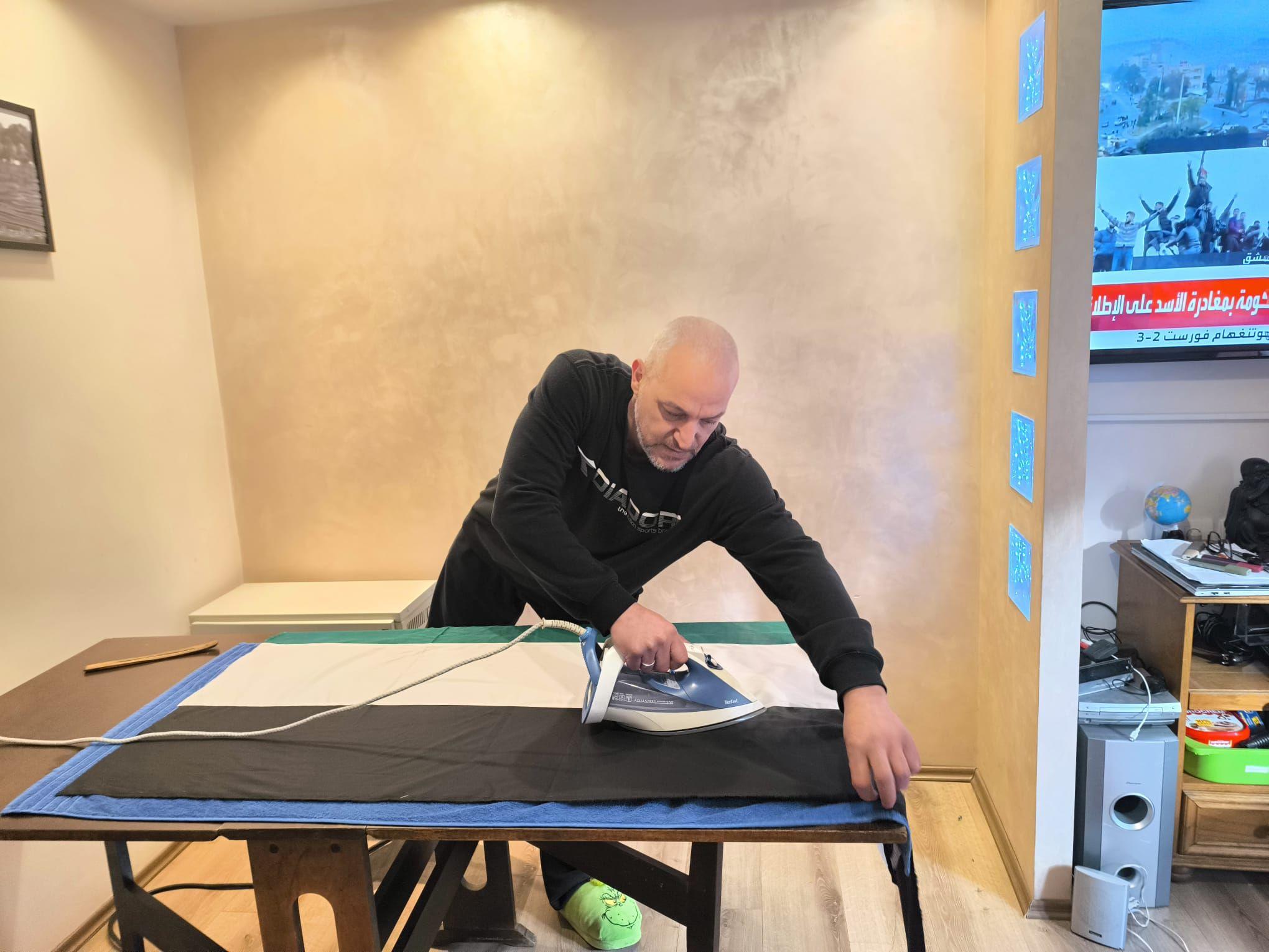 Kraj Asadovog režima - šta znači za Sirijce u Srbiji 5 hadžali pegla zastavu