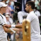 Janik Siner i Novak Đoković