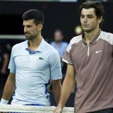 Novak Đoković i Tejlor Fric