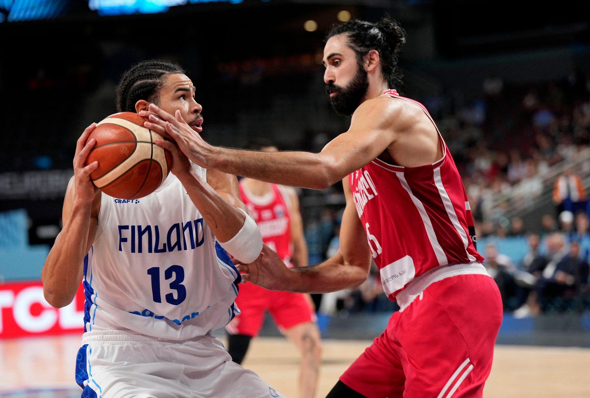 Dončićevih 39 poena malo, Tristanova trojka sa pola terena presudna: Nemci idu u polufinale Evrobasketa 5 Olivije Nkamua (levo) i kasnije isključeni Goga Bitadze (desno)