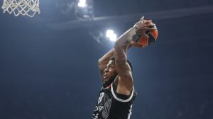 Tajrik Džons; Partizan