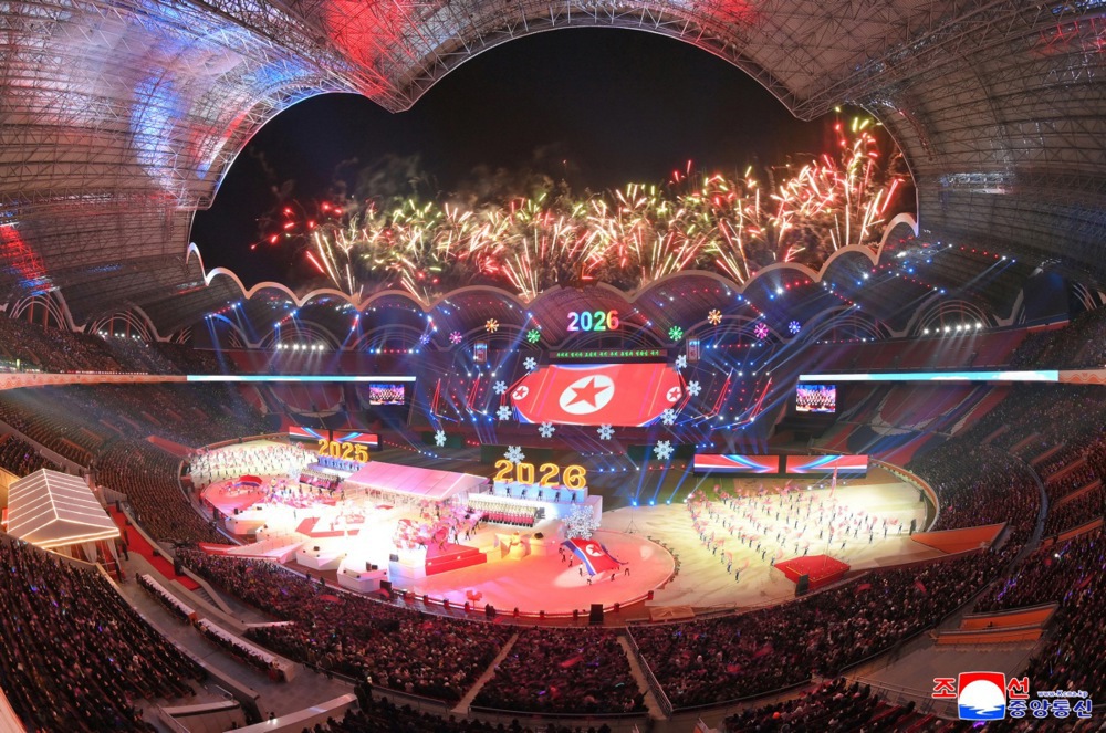 epa12620134 A photo released by the official North Korean Central News Agency (KCNA) shows fireworks erupting during an art performance celebrating the New Year 2026 at the May Day Stadium in Pyongyang, North Korea, 01 January 2026. According to KCNA, North Korean leader Kim Jong Un delivered a speech at the event lauding the country's successes in 2025 while calling for national unity ahead of the 9th Congress of the Workers' Party of Korea. 