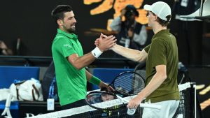 Janik Siner i Novak Đoković