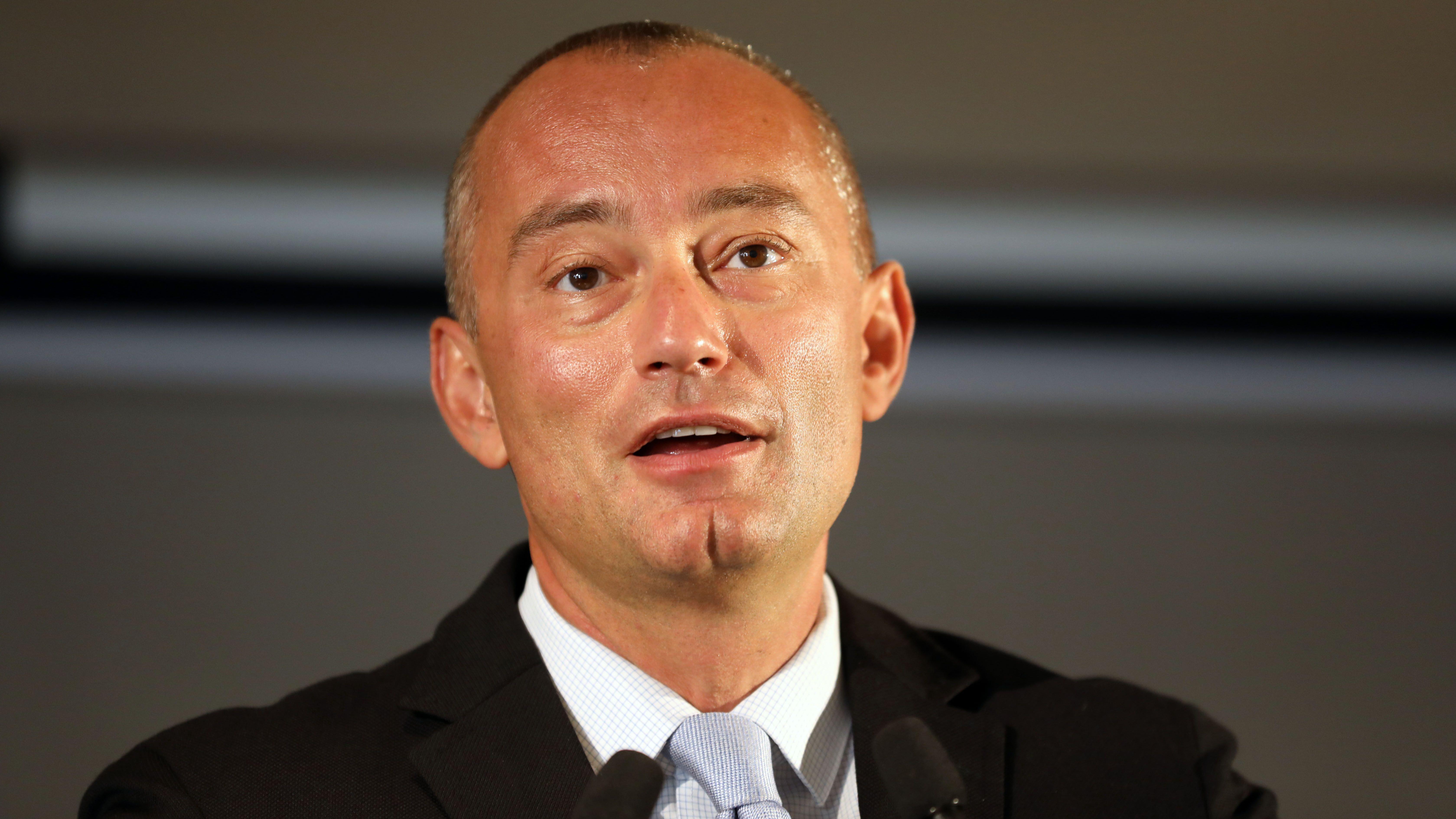 Nickolay Mladenov speaks at a podium.