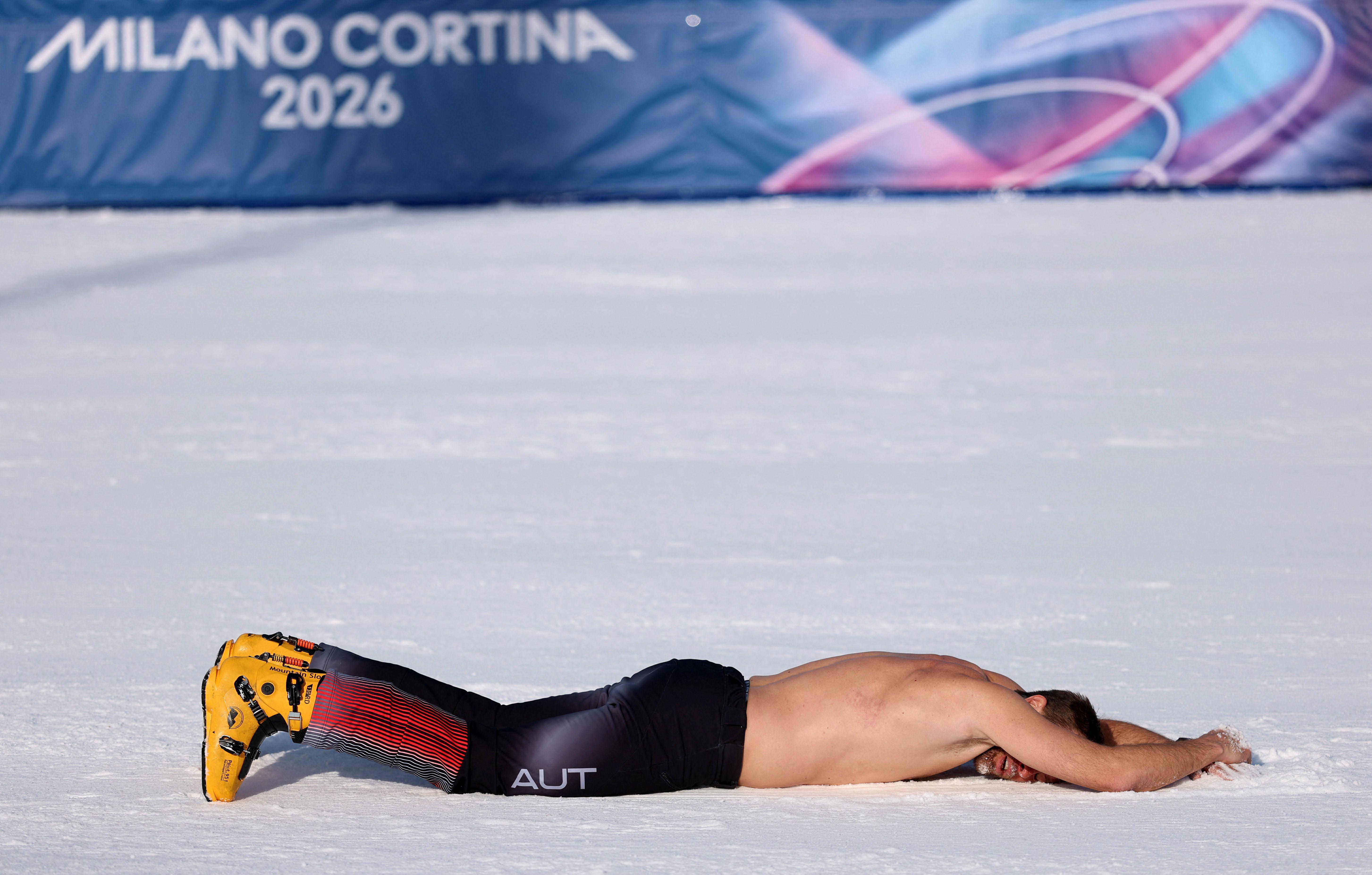 Benjamin Karl iz Austrije slavi osvajanje zlata u finalu paralelnog veleslaloma u muškoj konkurenciji protiv Sangkjuma Kima iz Južne Koreje, bord, zimske olimpijske igre u Italiji