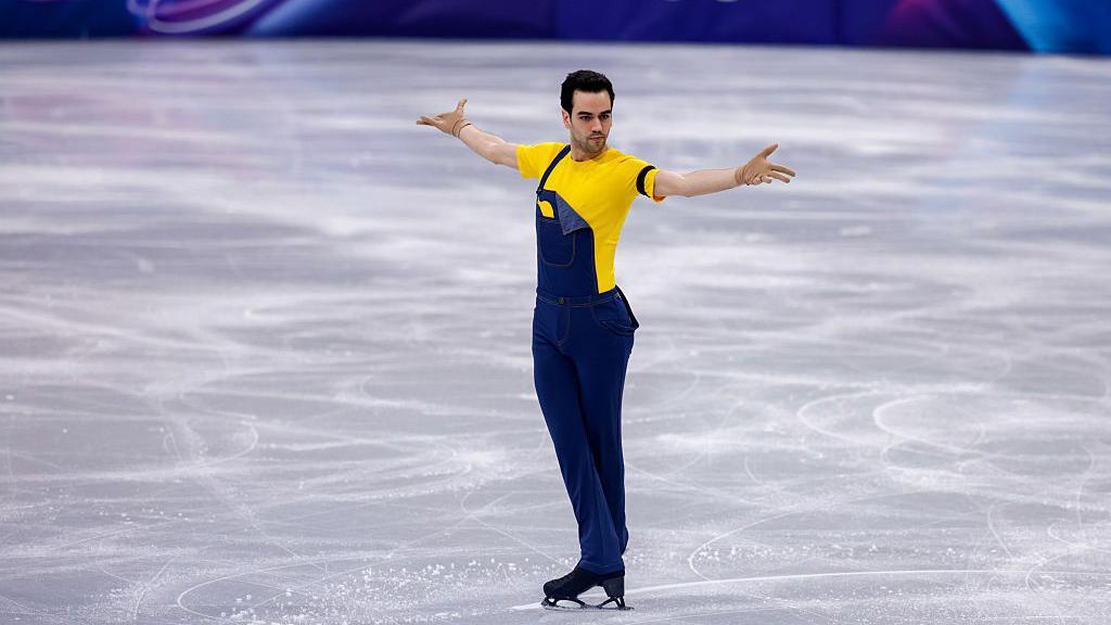 Čudne i divne priče sa Zimskih olimpijskih igara 4 Umetnički klizač Tomas Ljorenc Guarino Sabate na ledu na ZOI u odelu minjona